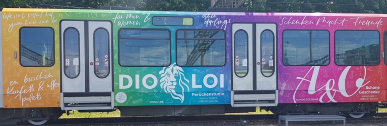 DIOLOI Perückenstudio Straßenbahnwerbung in Köln